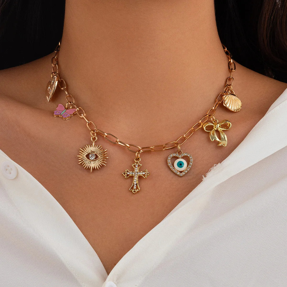 Collier breloque croix doré