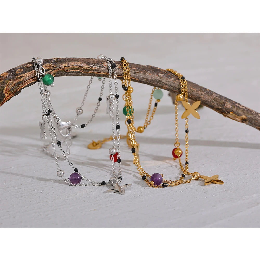 Bracelet à breloques croix argentées et pierres naturelles