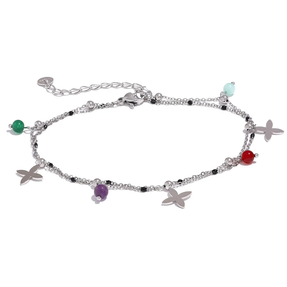 Bracelet à breloques croix argentées et pierres naturelles