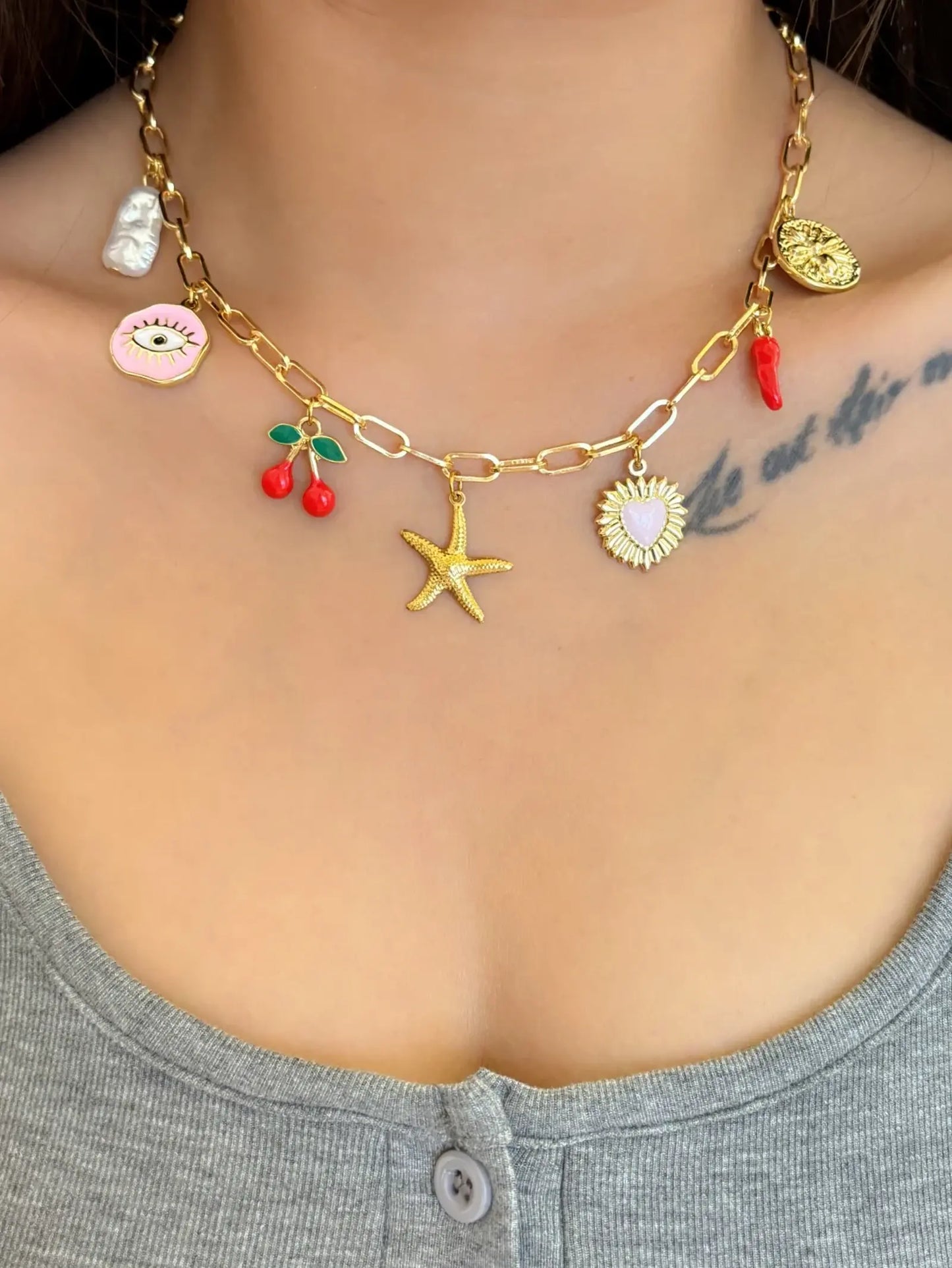 Collier breloque étoile de mer doré