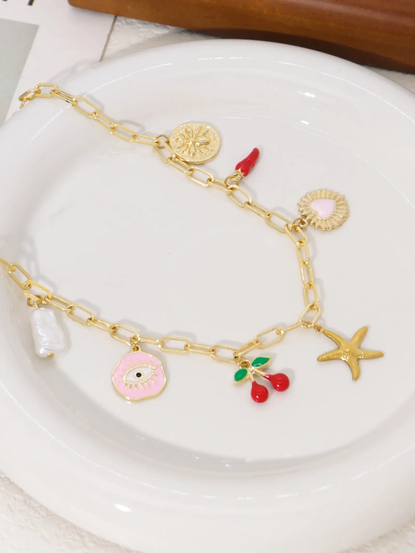Collier breloque étoile de mer doré