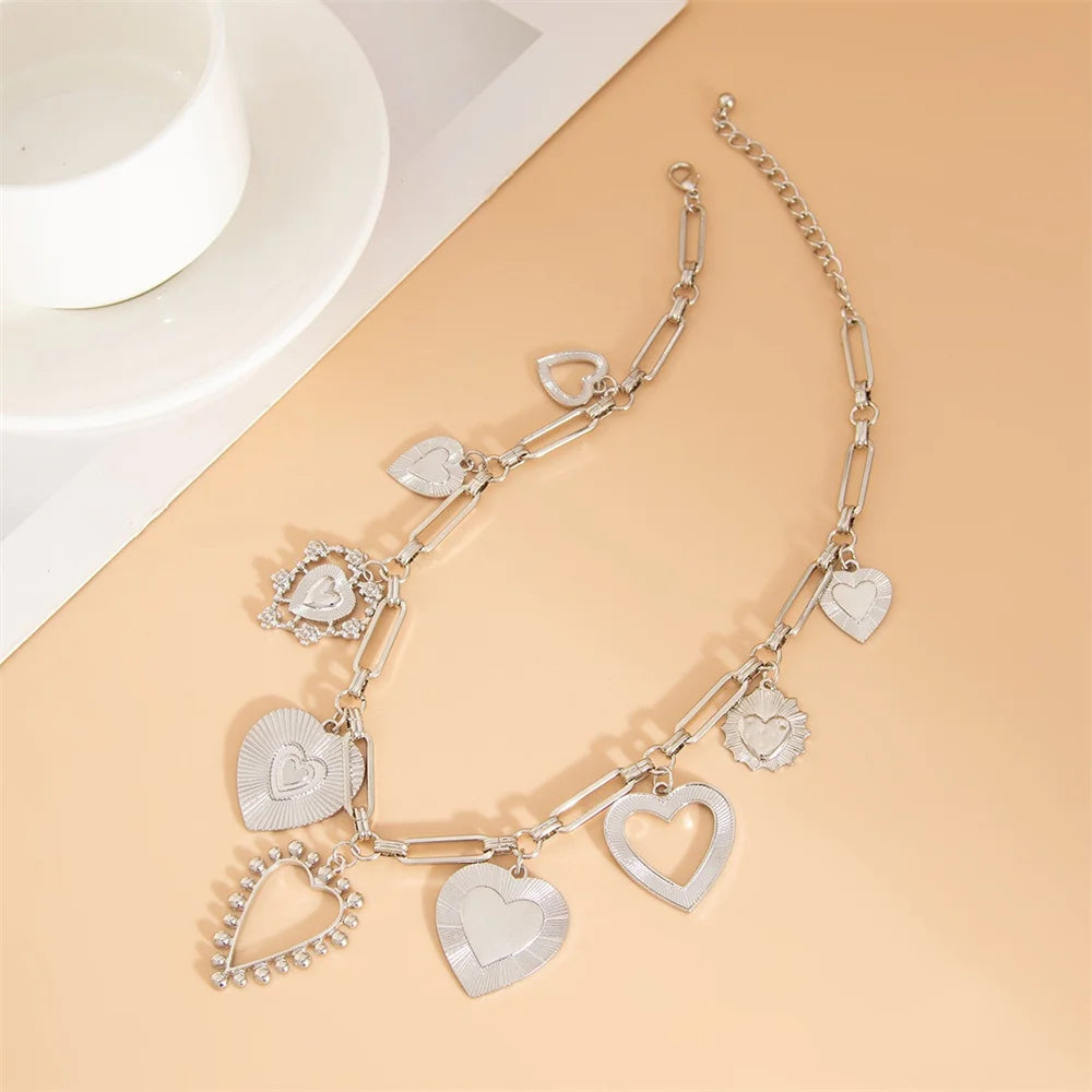Collier breloques gros coeurs argentés