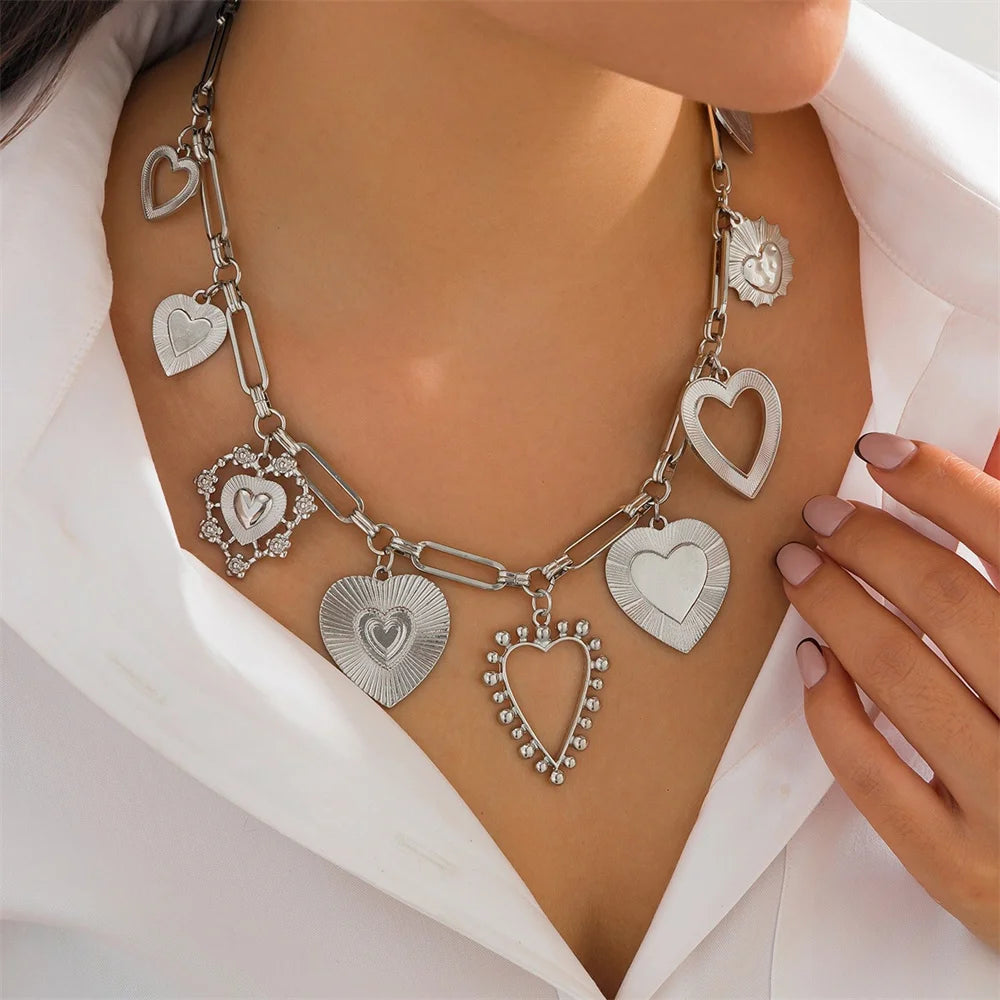Collier breloques gros coeurs argentés