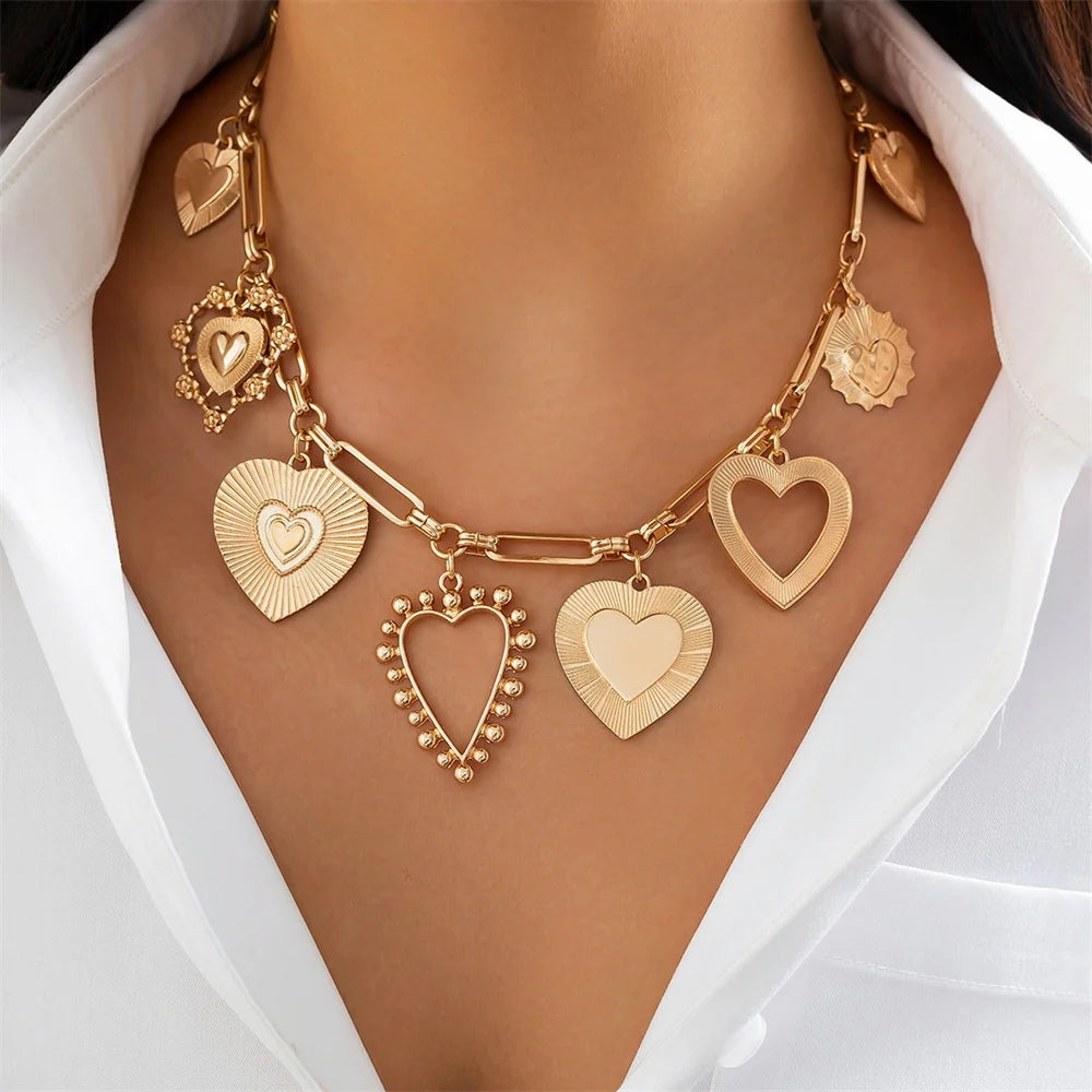 Collier breloques gros coeurs dorés