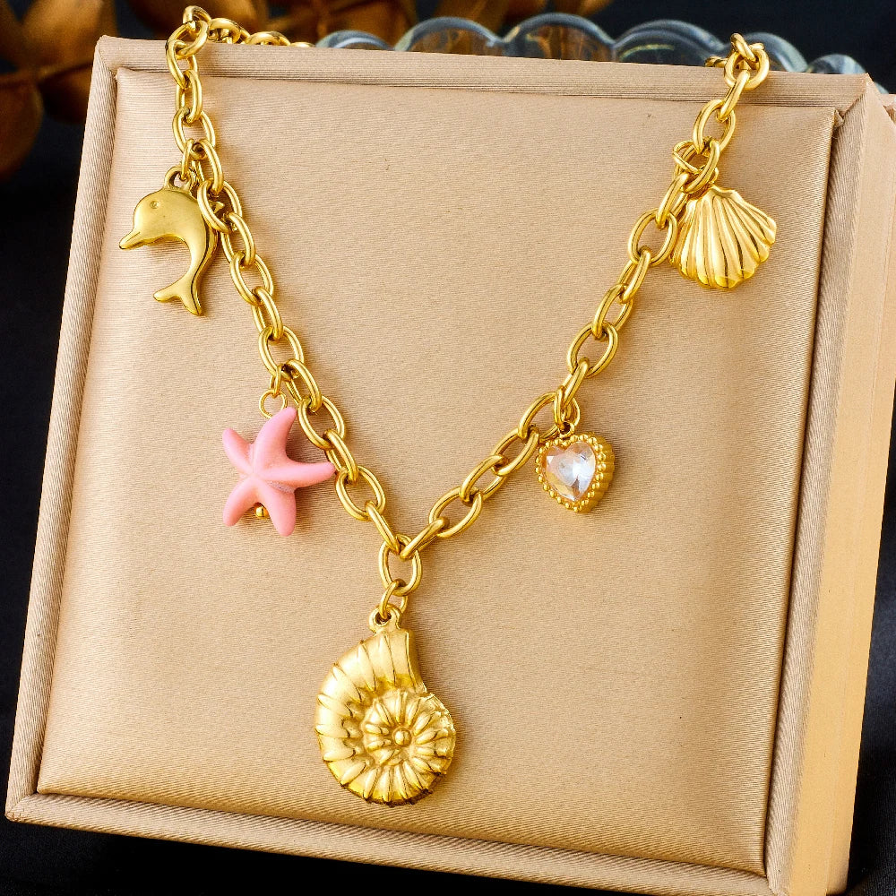 Collier à breloques étoile de mer avec coquillage doré