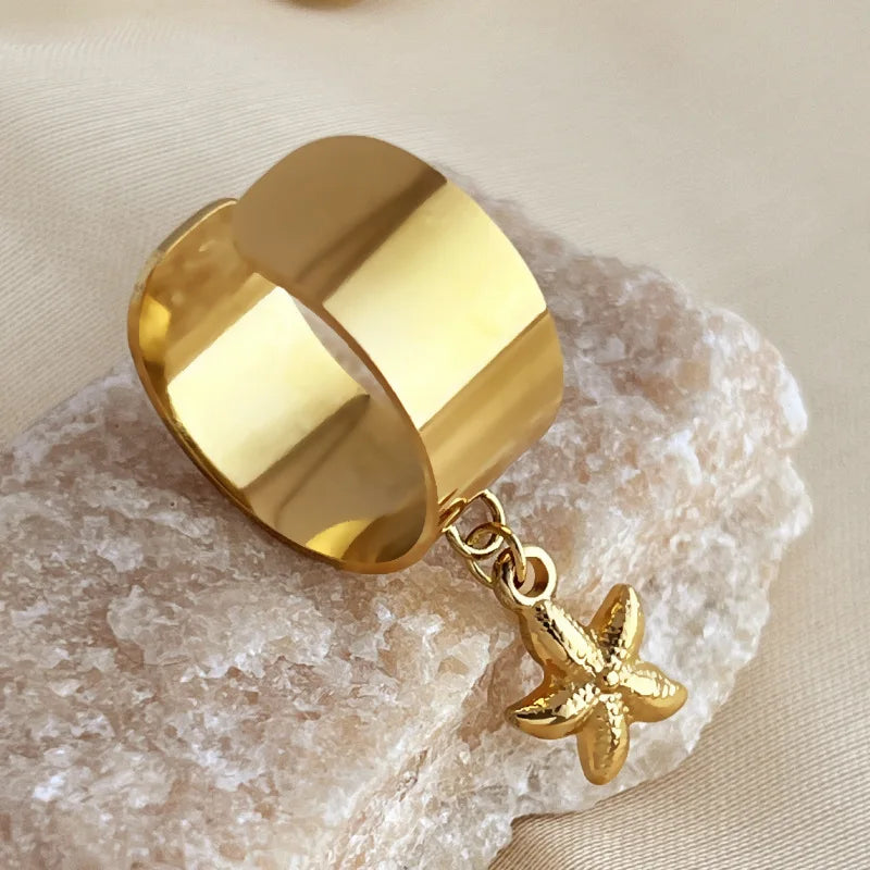 Bague breloque ajustable à étoile de mer dorée