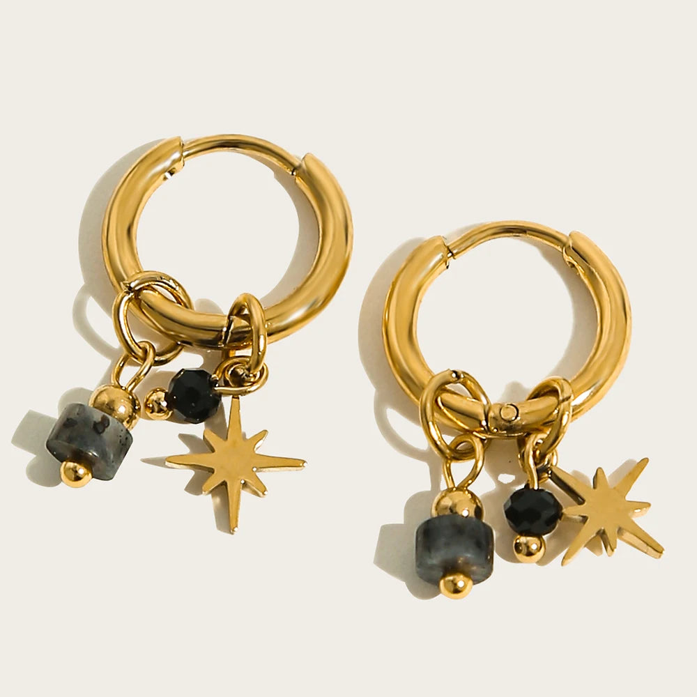 Boucles d'oreilles créoles à breloques noires et étoile doré