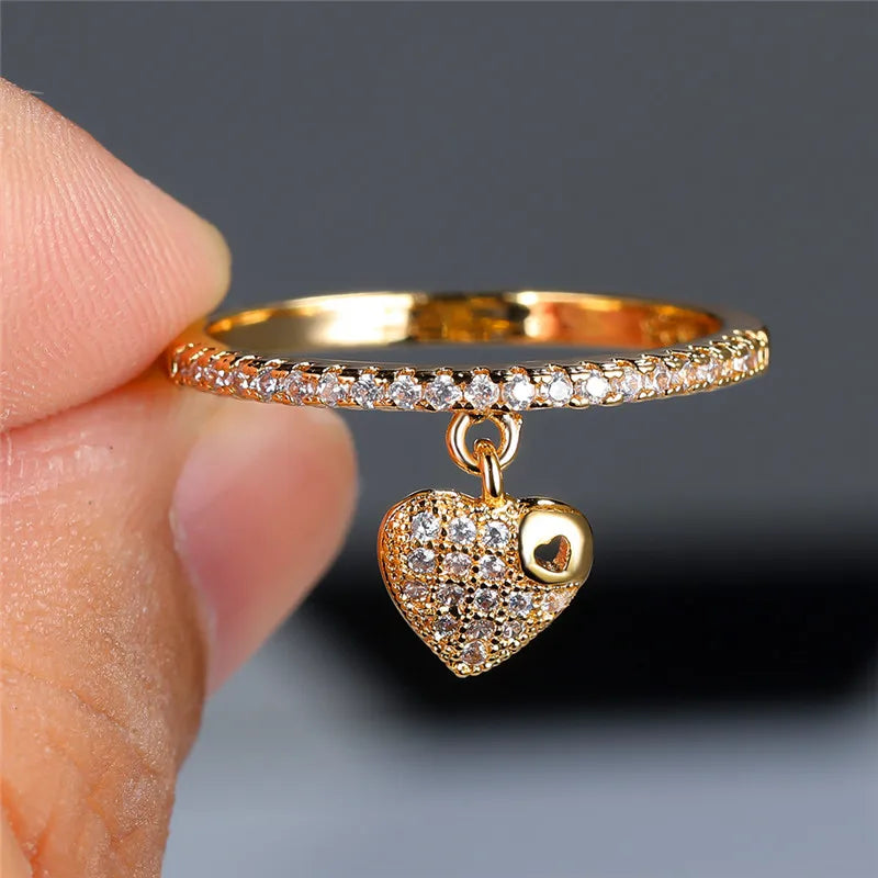 Bague fine à breloque coeur dorée
