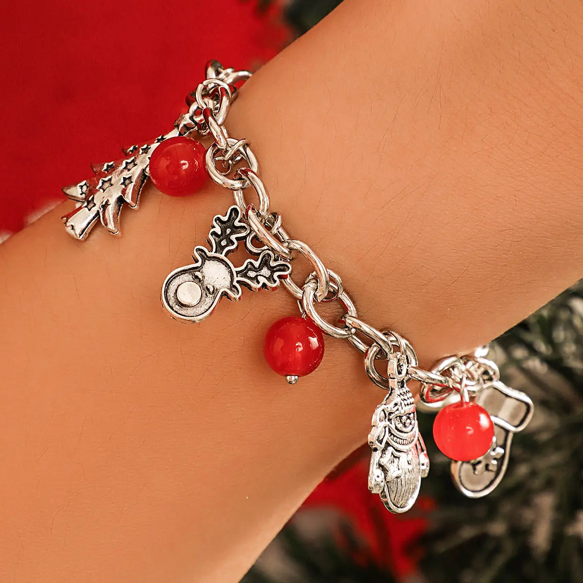Bracelet à breloques de noël argenté et rouge