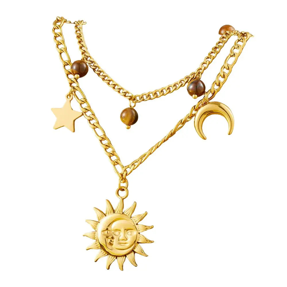 Collier à breloques avec soleil, lune et étoile doré