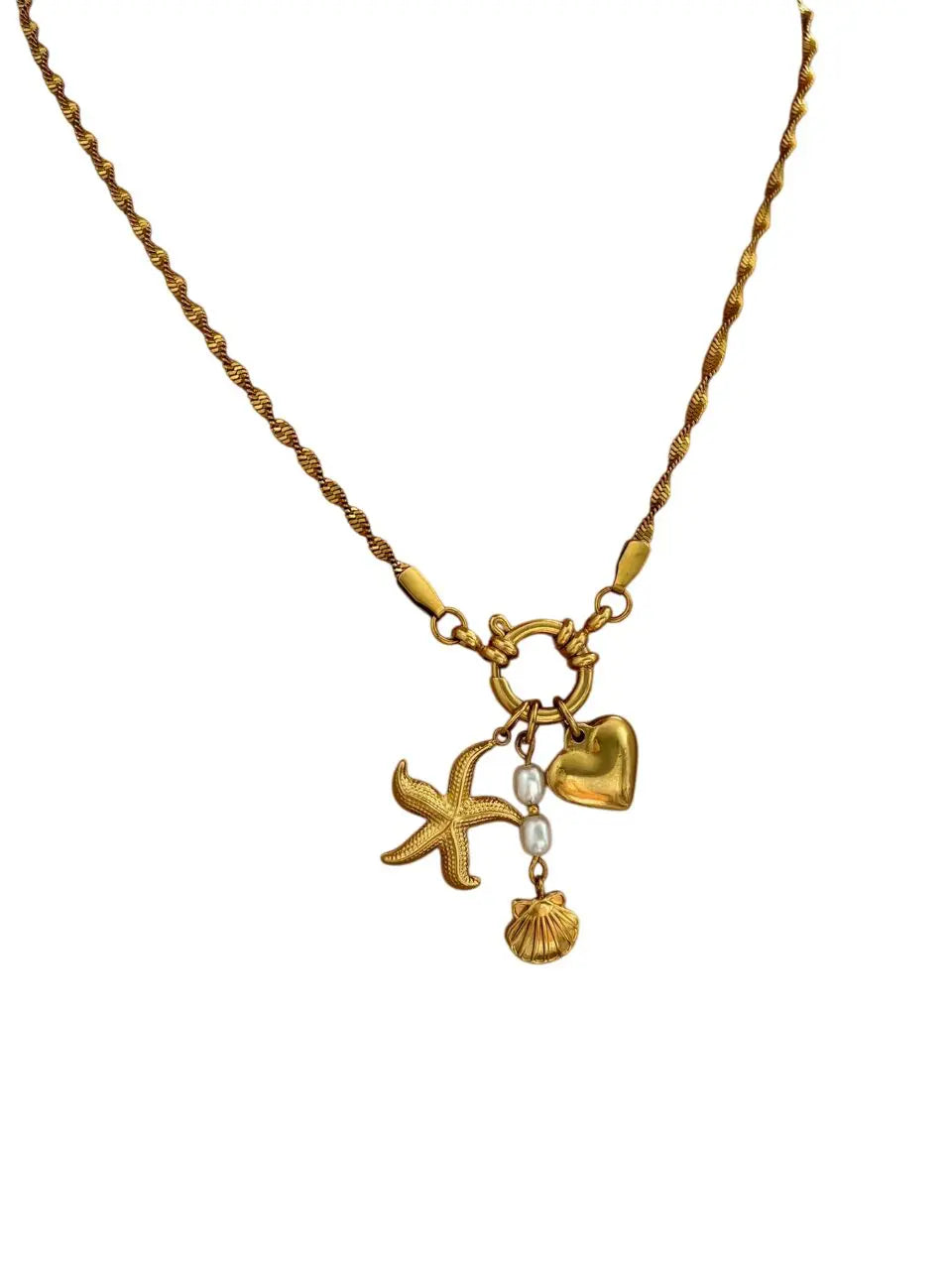 Collier à breloques étoile, coeur et grelot dorées