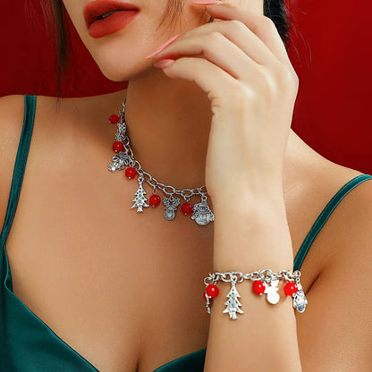 Collier à breloques de noël argenté et rouge