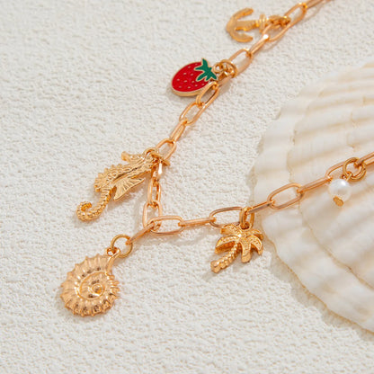 Collier breloque coquillage doré