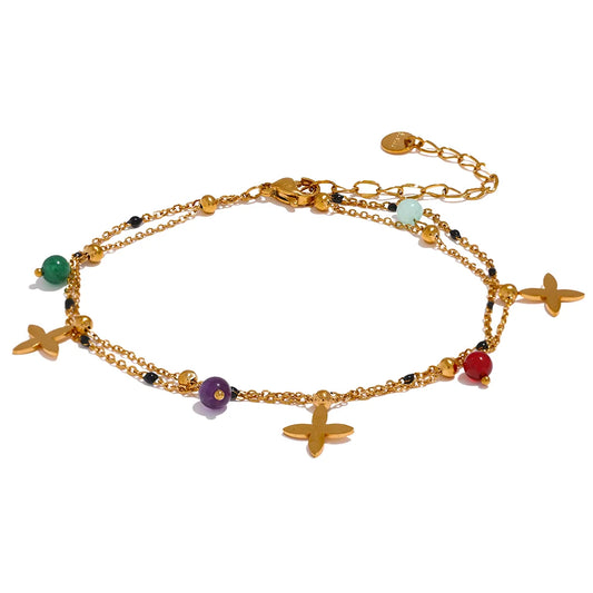 Bracelet à breloques croix dorées et pierres naturelles