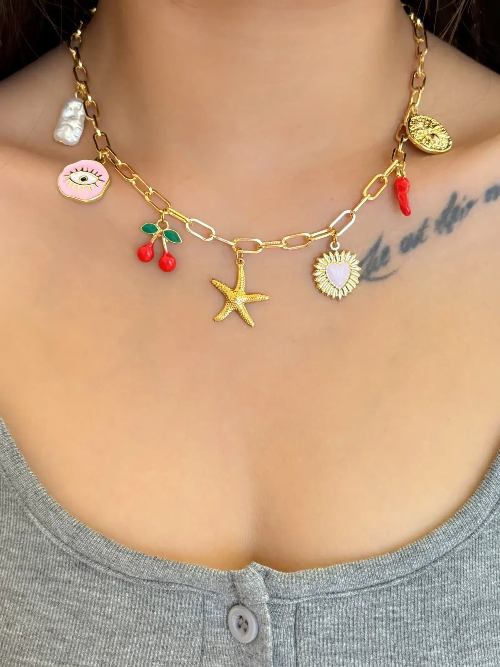 Collier breloque étoile de mer doré