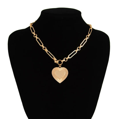 Collier breloque gros coeur doré