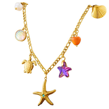 Collier à breloques doré et étoile de mer