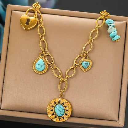 Collier à breloques doré et turquoises