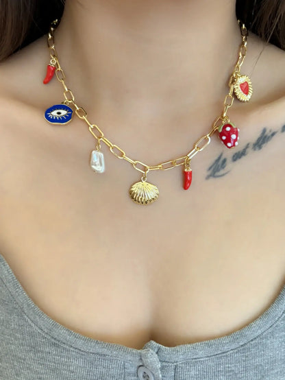 Collier à breloques coquillage doré