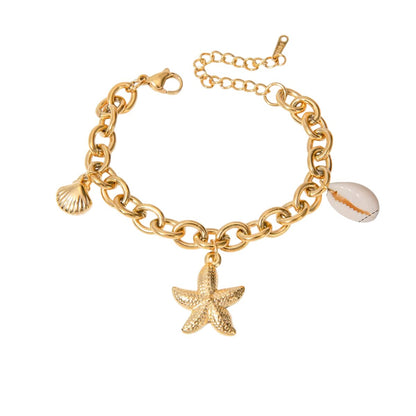 Bracelet à breloques avec coquillages doré