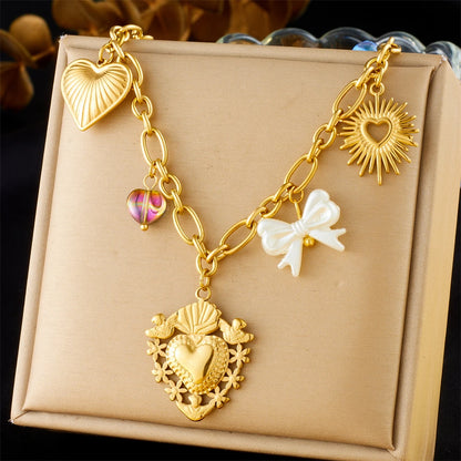 Collier à breloques avec coeur et étoiles doré