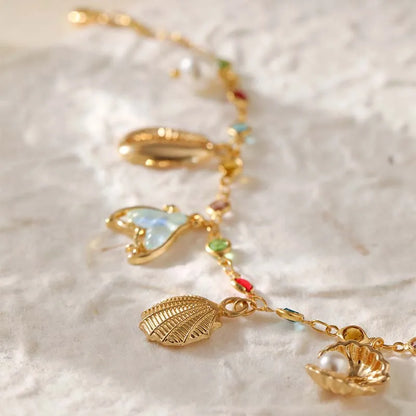 Bracelet breloques de la mer à chaîne et pierres multicolores