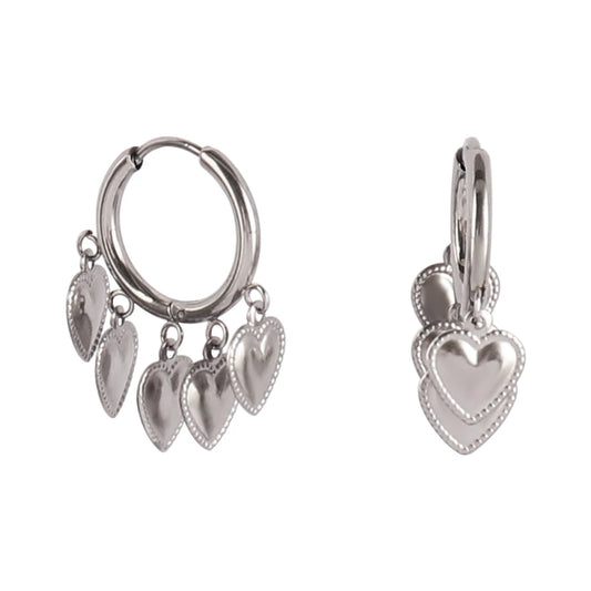 Boucles d'oreilles breloques coeurs argentées