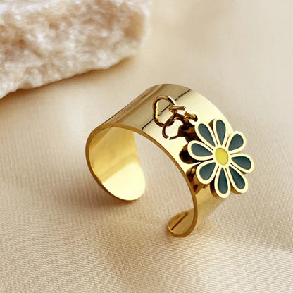 Bague breloque ajustable à fleur verte et dorée