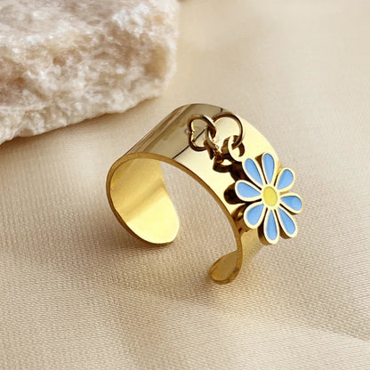 Bague breloque ajustable à fleur turquoise et dorée