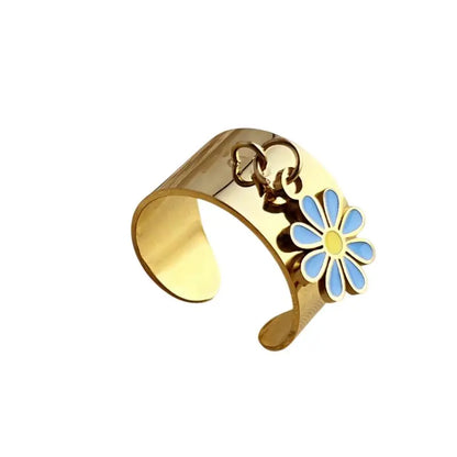 Bague breloque ajustable à fleur turquoise et dorée