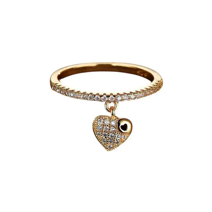 Bague fine à breloque coeur dorée