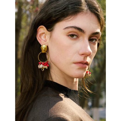 Boucles d'oreilles breloques coquillage et corail dorées