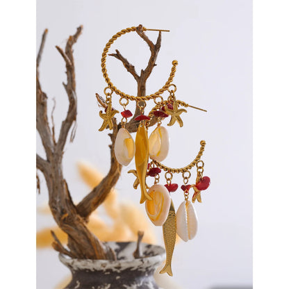 Boucles d'oreilles coquillages dorées