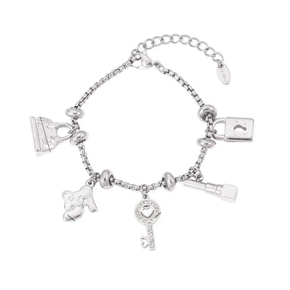 Bracelet à breloques argenté avec clips et clé brillante