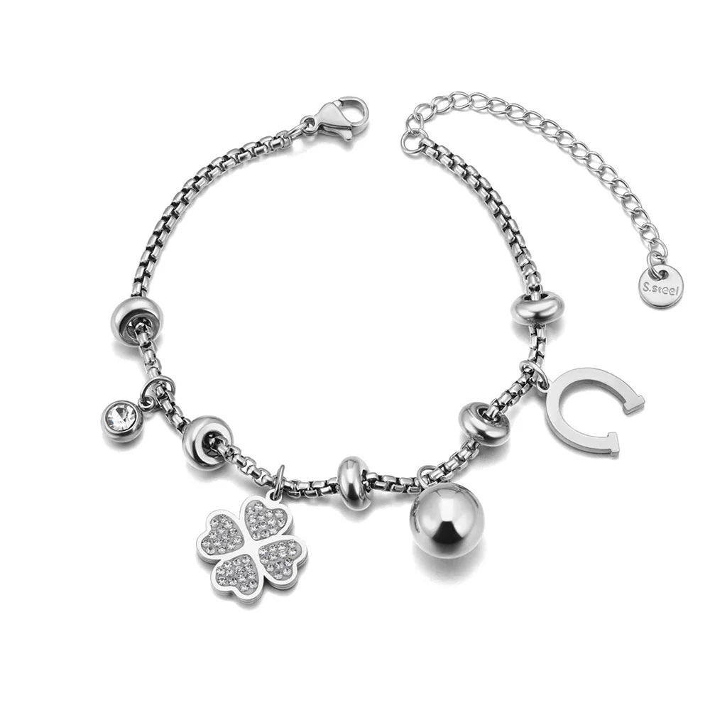 Bracelet à breloques argenté avec clips et trèfle à 4 feuilles
