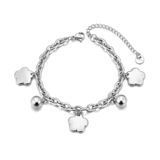 Bracelet à breloques argenté avec trèfles et grelots