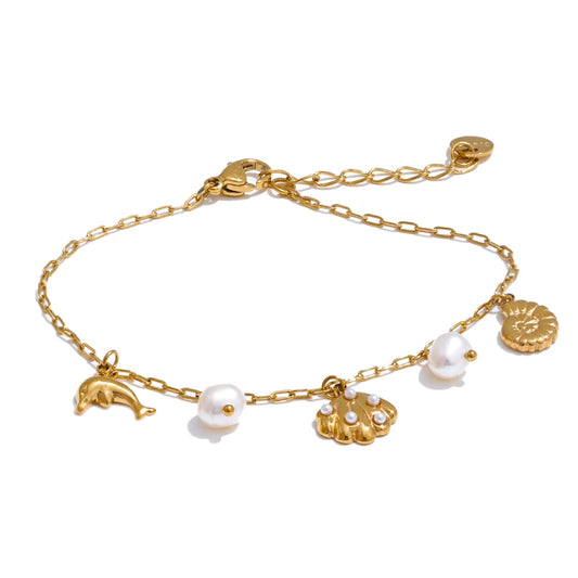 Bracelet à breloques avec coquillage perlé doré
