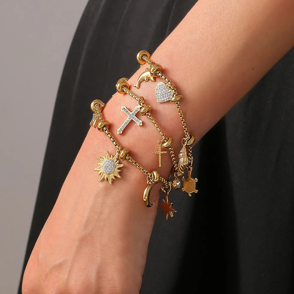 Bracelet à breloques doré avec clips et étoile scintillante