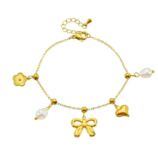 Bracelet breloques noeud papillon doré