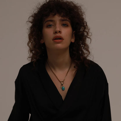 Collier à breloque turquoise doré