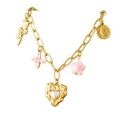 Collier à breloques avec coeur nacré doré