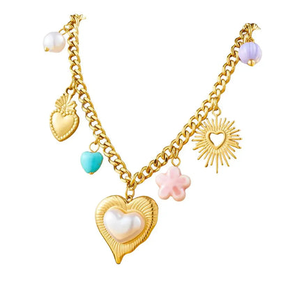 Collier à breloques avec gros coeur doré