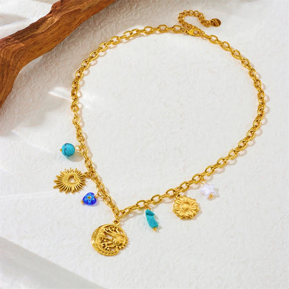 Collier à breloques avec lune et soleil doré