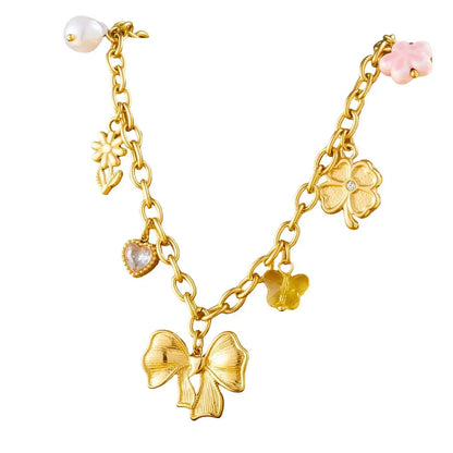 Collier à breloques avec noeud papillon doré