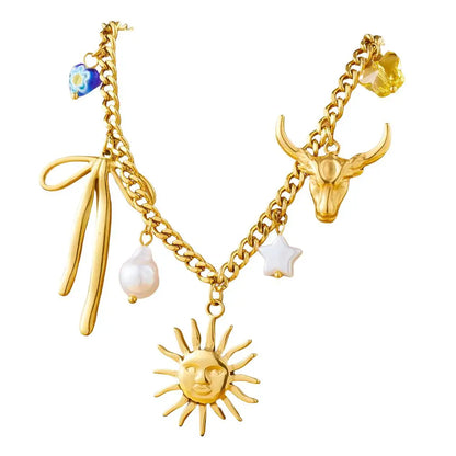 Collier à breloques avec soleil et ruban doré