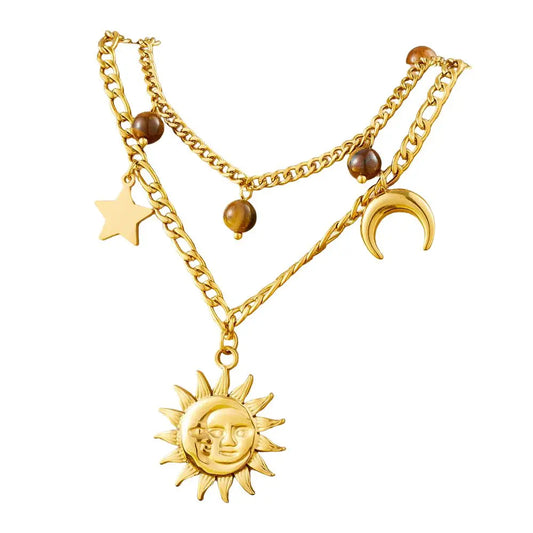 Collier à breloques avec soleil, lune et étoile doré