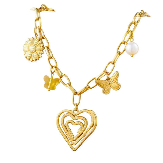 Collier à breloques doré avec coeur à relief