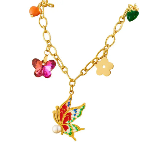 Collier à breloques doré et fée