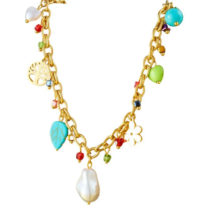 Collier à breloques doré et perle blanche