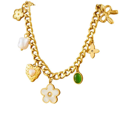 Collier à breloques doré fleur blanche